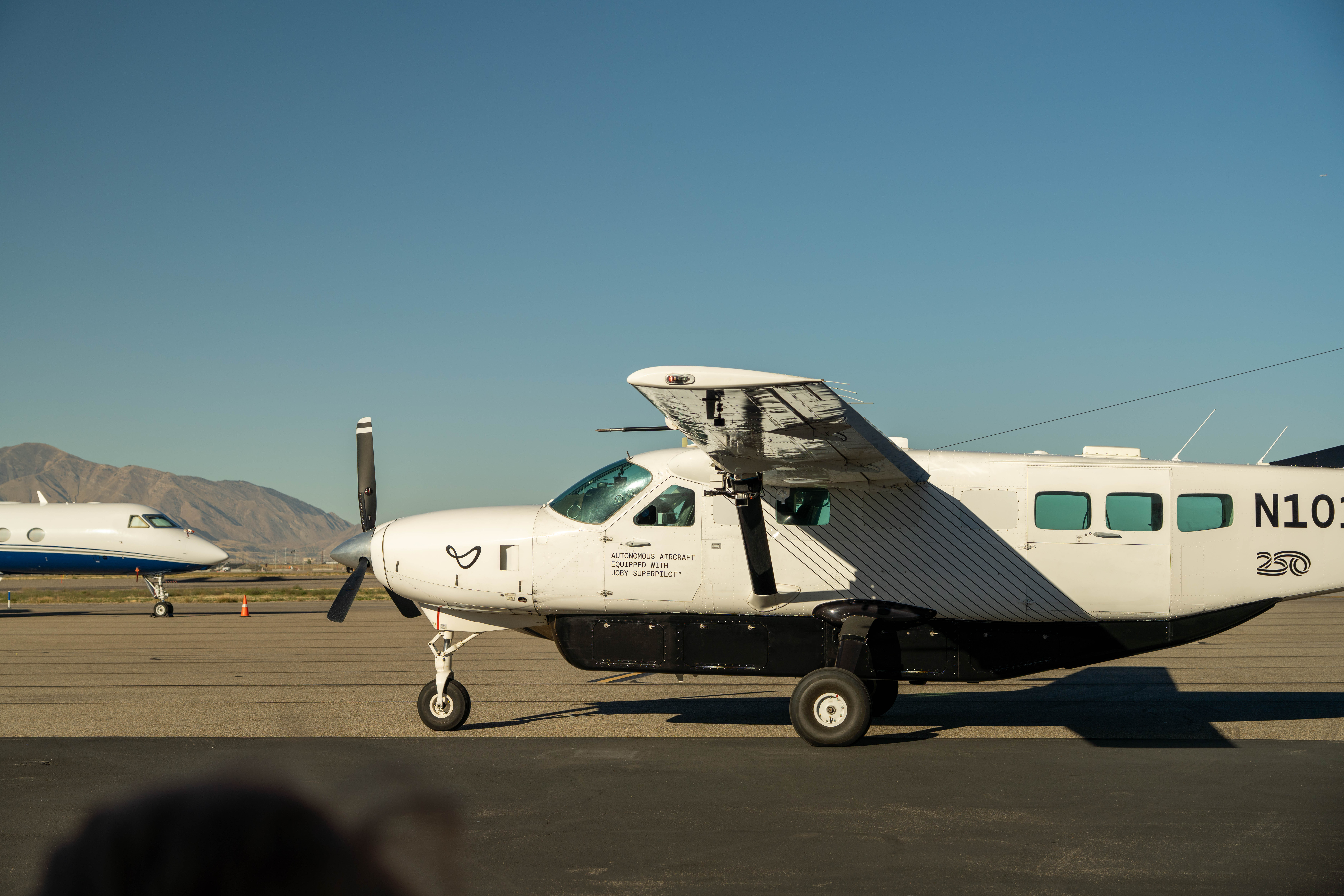 Joby's J208 aircraft parked on the UDOT hangar airstrip.