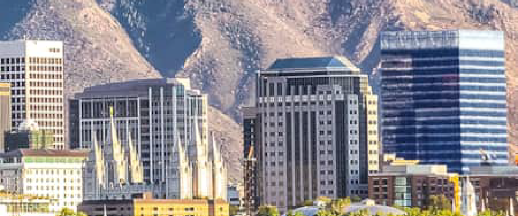 The Salt Lake City Wasatch Mountains Skyline with a cityscape at the bottom.